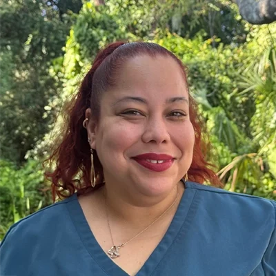 Chiropractic Lutz FL Liz Liz smiling outside.