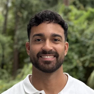Chiropractor Lutz FL Alex Tosado Alex Tosado smiling outside.
